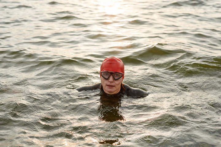Woman Swimming In Lake Or Sea 1173149